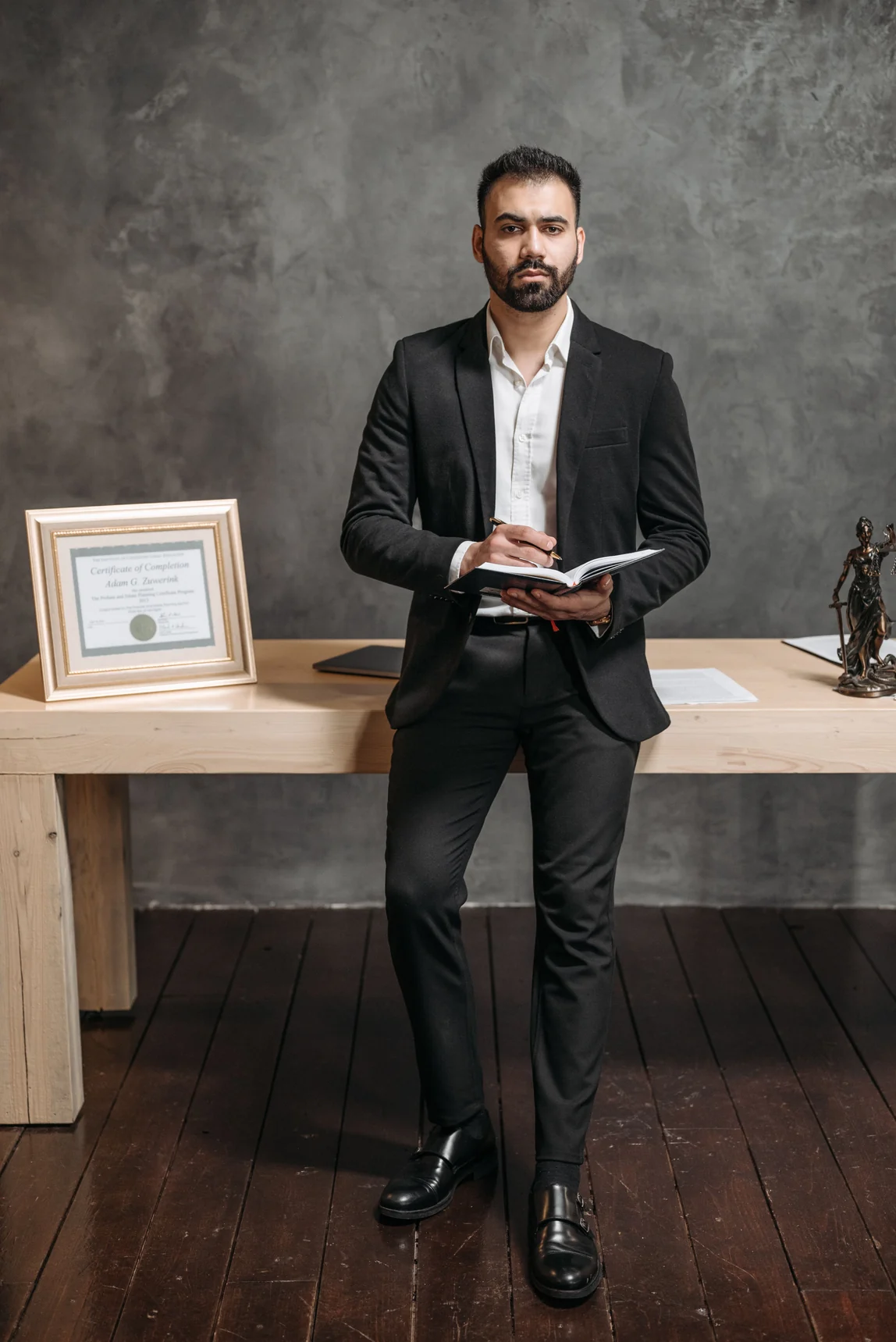 Professional in executive attire in an office setting